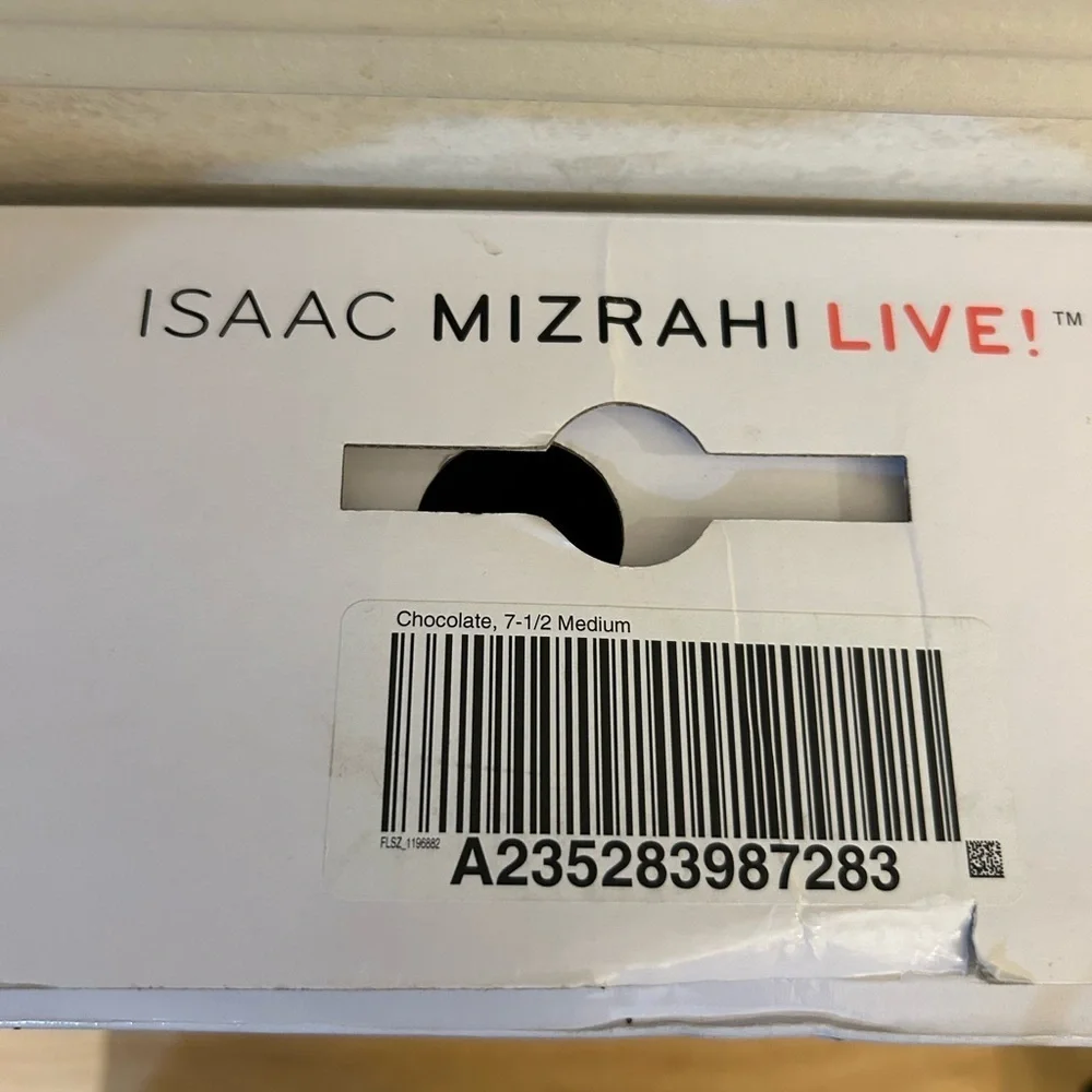 Isaac Mizrahi Live brown leather knee-high riding boots.